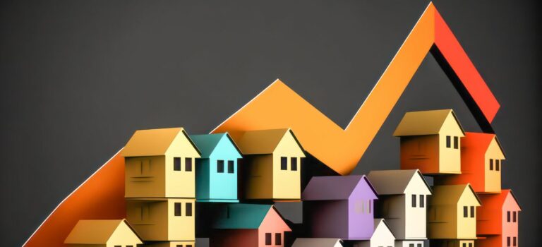 Des cubes de maisons empilées et un graphique représetant la hausse puis la baisse du marché immobilier.