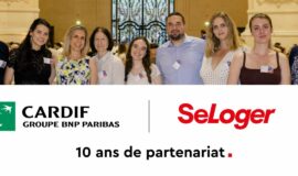 Équipes Cardif et SeLoger réunies pour les 10 ans de leur partenariat, avec les logos des deux marques.