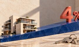 Illustration d’un immeuble sur une pente ascendante vers le seuil des 4 %, symbolisant la hausse des taux de crédit immobilier